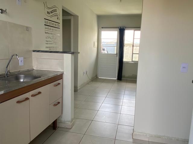 Charmosa Casa com Quintal e 2 Vagas no Feital