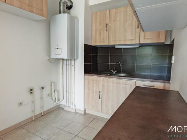 Charmant Appartement de type F2 2 places de parking Balcon