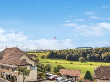 Charmant appartement en attique de 150 m² avec balcon