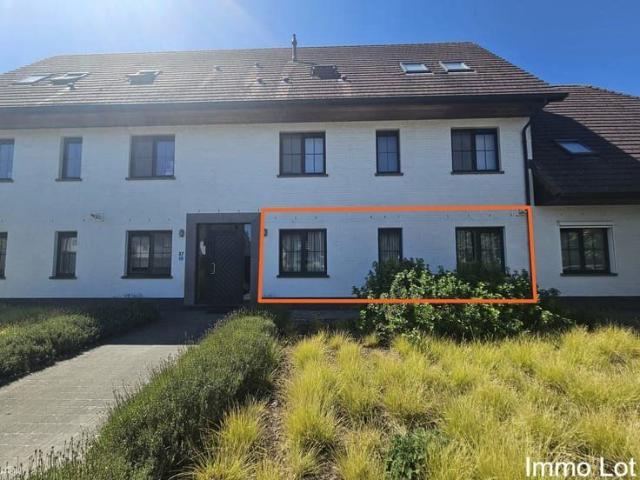 Charmant gelijkvloers appartement met terras en garage
