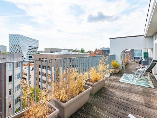 Charmant penthouse met twee zonneterrassen en adembenemend