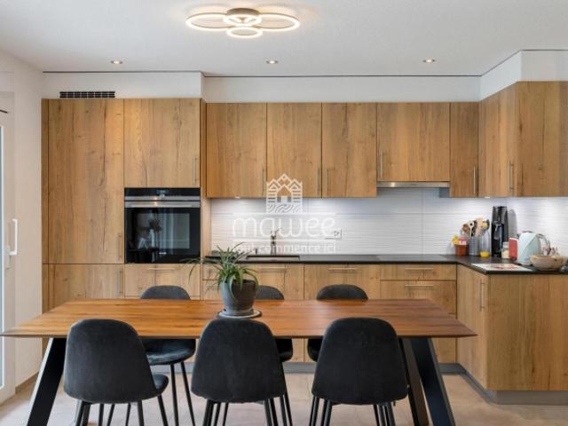 Charmante 3,5 Zimmer Wohnung mit Terrasse, Garten und zwei Parkplätzen