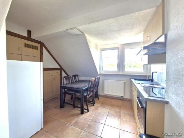 Charmante 3 Zimmer Dachgeschosswohnung mit Einbauküche