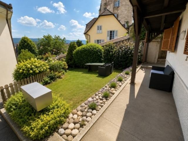 Charmante 2,5 Zimmer Wohnung mit privatem Garten in Porrentruy – eine seltene Chance