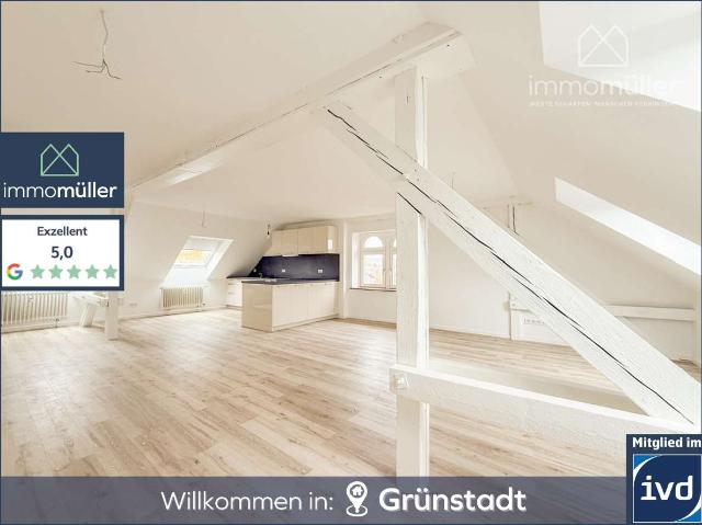 Charmante 2ZKB Dachgeschosswohnung mit Einbauküche und Gartenmitbenutzung in zentraler Lage!