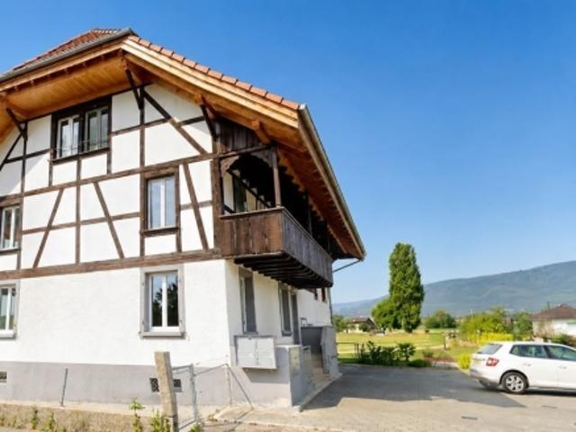 Charmante 4,5 Zimmer Wohnung mit separatem Eingang, Privatgarten und Weitblick