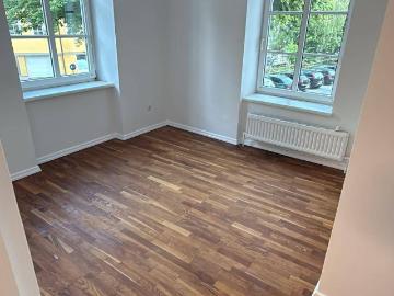 Charmante Altbauwohnung am Mühlbach mit Blick auf den Ledererturm – 52 m²