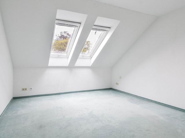 Charmante Dachgeschosswohnung mit 63m² und Tiefgaragenstellplatz