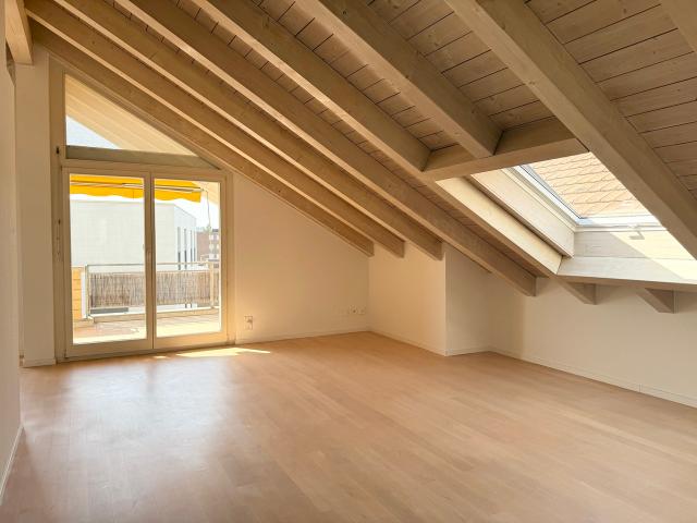 Charmante Dachwohnung an stadtnaher und sonniger Lage!
