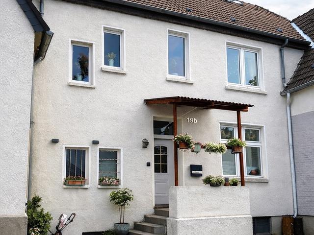 Charmante Eigentumswohnung im Reihenmittelhaus Stil
