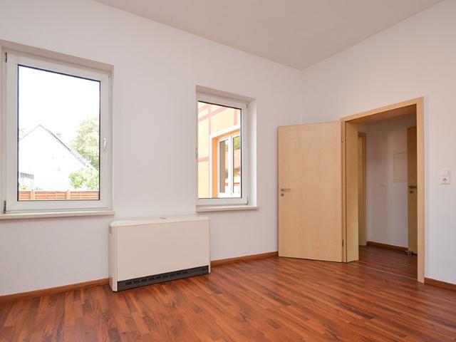 Charmante Erdgeschosswohnung mit Garten und Balkon!