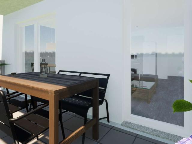 Charmante Erdgeschoss Wohnung mit offenem Wohn und Kochbereich, Terrasse und Garten