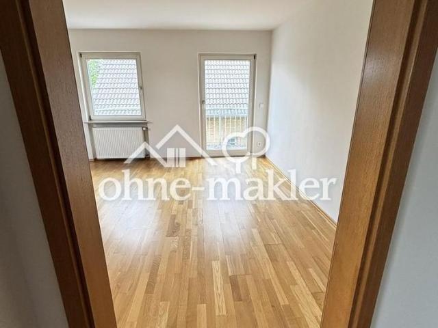 Charmante OG Wohnung mit Balkon, hochwertiger Einbauküche und Parkplätzen