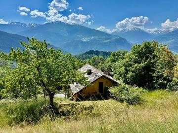 Charmante maison avec terrain à bâtir