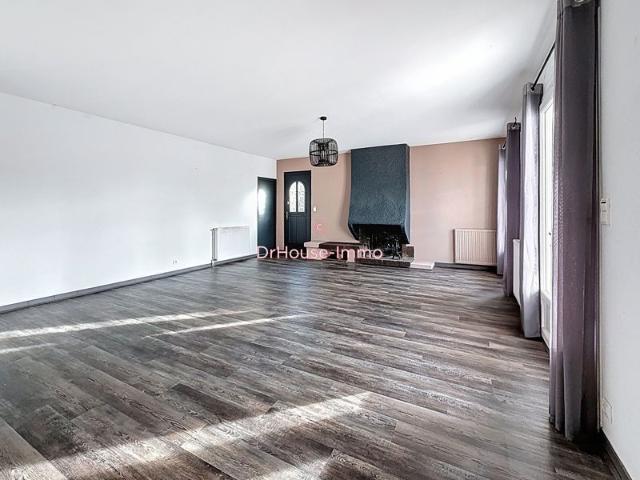 Maison de plain pied 104 m² avec garage et jardin