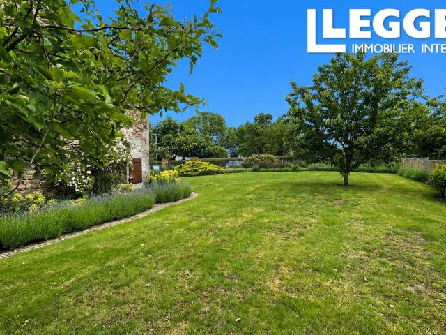 Charmante maison située dans un hameau paisible avec jardin, garage et terrain boisé