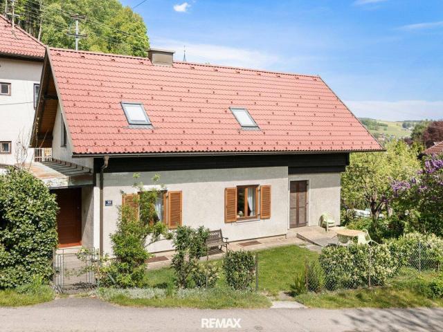 Charmante Wohnimmobilie in Feldkirchen mit Stadtblick und angenehmem Wohnflair
