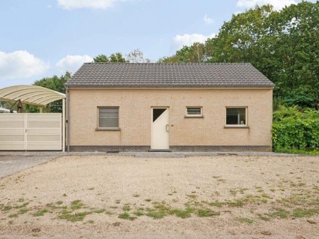 Charmante vakantiewoning met prachtige tuin en zwemvijver
