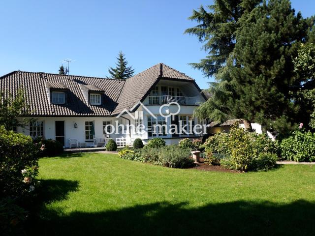 Charmante Villa im Landhausstil mit traumhaftem Garten und separater Einliegerwohnung