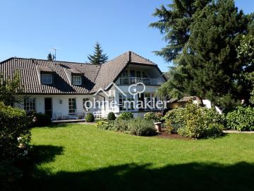 Charmante Villa im Landhausstil mit traumhaftem Garten und separater Einliegerwohnung