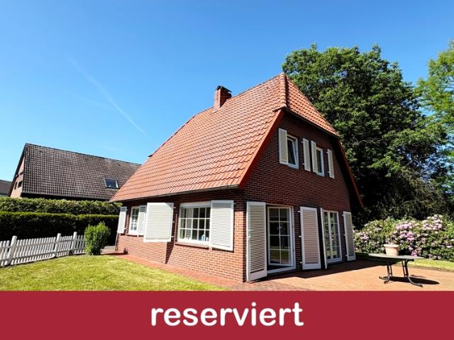 Charmantes Einfamilienhaus mit idyllischer Gartenanlage und Carport in ruhiger Lage in BZ Rostrup
