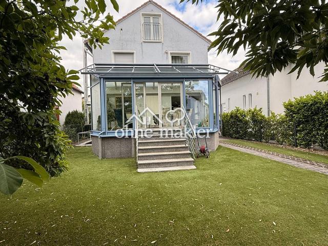 CHARMANTES EINFAMILIENHAUS MIT LICHTDURCHFLUTETEM WINTERGARTEN AUF IDYLLISCHEM GRUNDSTÜCK