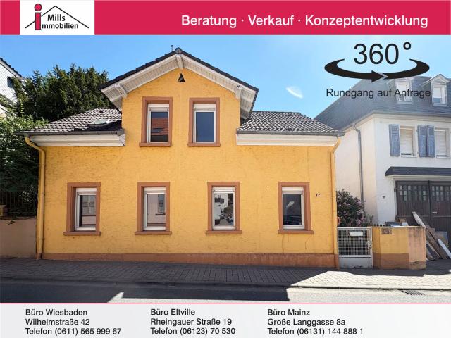 Charmantes Einfamilienhaus mit privatem Innenhof in ruhiger Lage