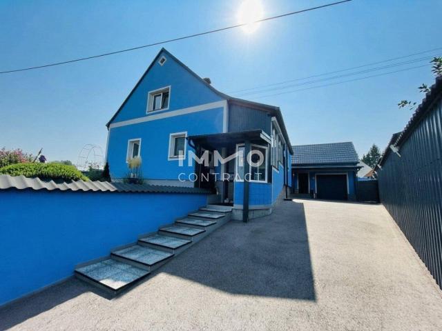 Charmantes Einfamilienhaus mit Wintergarten und überdachter Terrasse in sonniger Lage