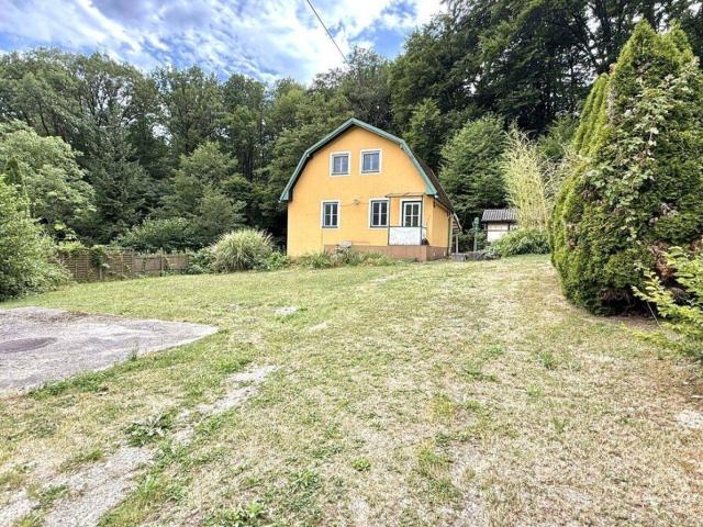 Charmantes Kleingartenhaus in idyllischer Grünruhelage – Wohnen im Grünen im 14. Bezirk