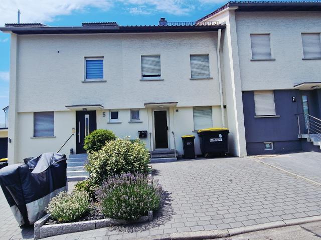 Charmantes Reihenmittelhaus mit Garten, Terrasse und Parkplatz in ruhiger Lage