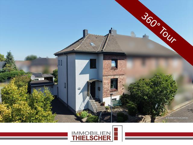 Charmantes Reihenendhaus mit liebevoll angelegtem Garten und Garage in Palenberg