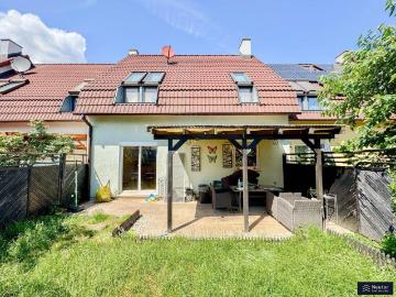 Charmantes Reihenhaus mit sonnigem Garten in ruhiger Grünlage
