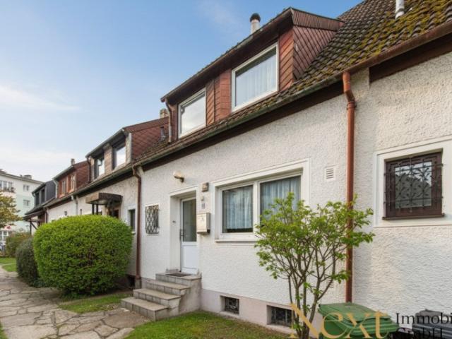 Charmantes Reihenhaus mit Terrasse und Garten zu verkaufen!