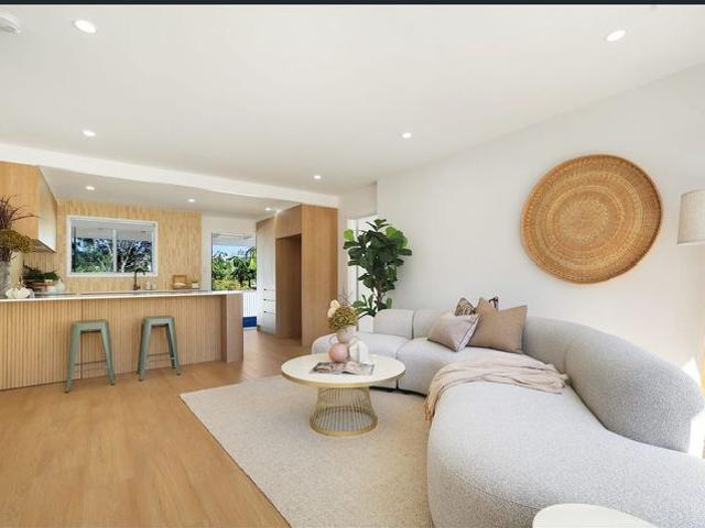 Charming 4 Bedroom Home with Expansive Covered Deck in Southport