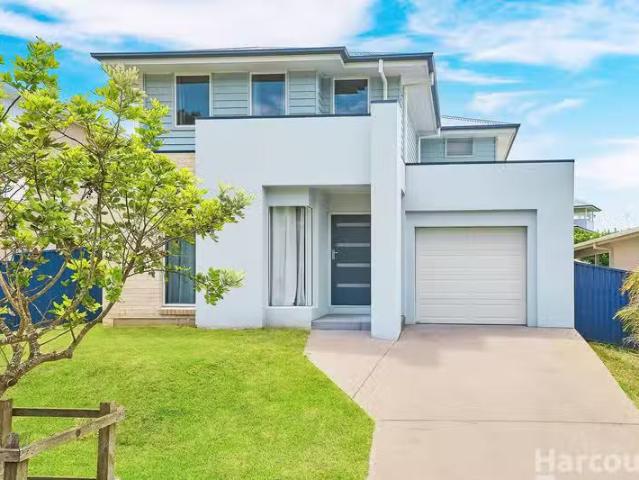 Charming 4 BR 51 Seaside Drive, Lake Cathie, NSW 2445 House.