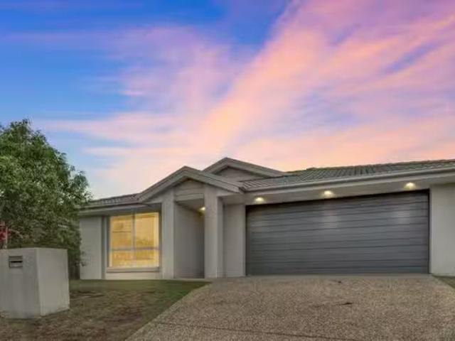 Charming 4 BR 9 Combs Street, YARRABILBA, QLD 4207 House for.