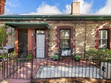 Charming 1890's Cottage, Beautifully Reborn in Prolific Parkside