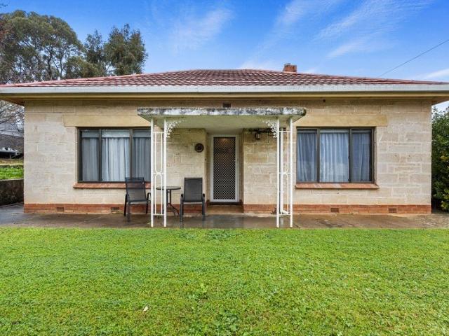 Charming 1950s Home on a Generous Corner Allotment