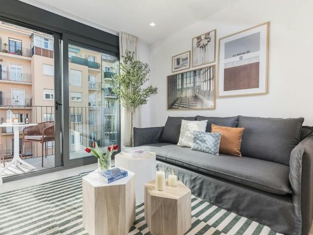 Charming 2 Bedroom Apartment with Rooftop Terrace in Gràcia, Barcelona Amsterdam Apartments for Rent