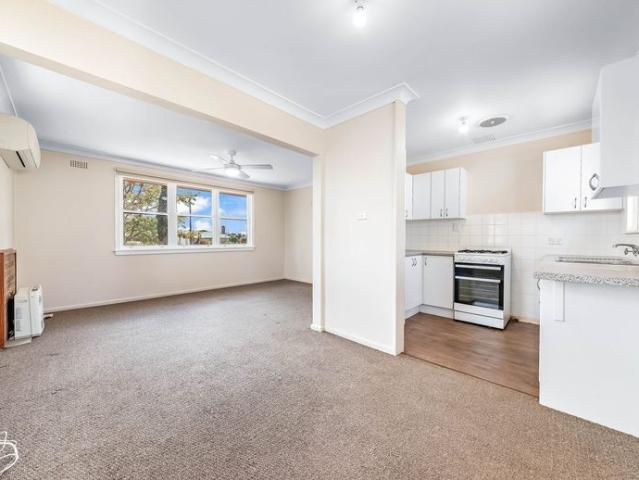 Charming 2 Bedroom Brick Home