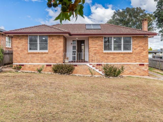 Charming 2 Bedroom Brick Home