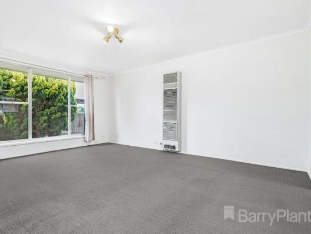 Charming 2 Bedroom Front Unit with Private Courtyard