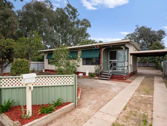 Charming 2 Bedroom Home with Outdoor Appeal