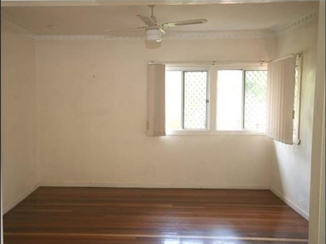 Charming 2 Bedroom Home with Huge Garage & Fully Fenced Yard