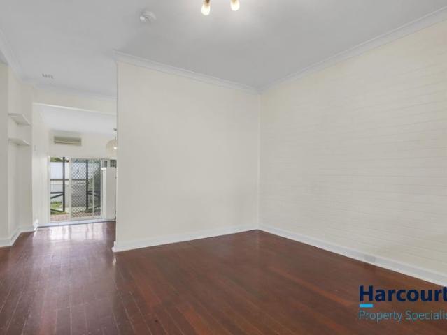 Charming 2 Bedroom Home with Spacious Backyard