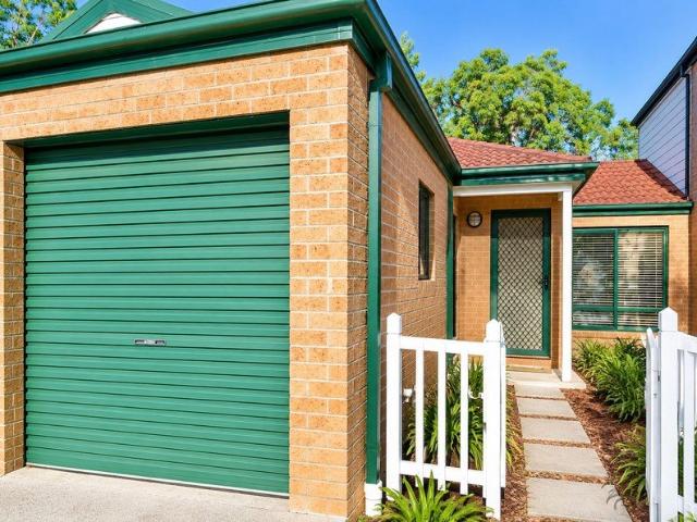 Charming 2 Bedroom Townhouse with Lock Up Garage