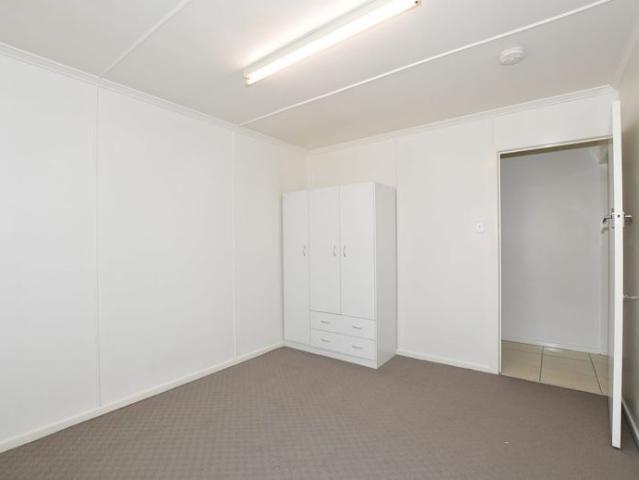 Charming 2 Bedroom Unit with Private Yard & Lock Up Garage