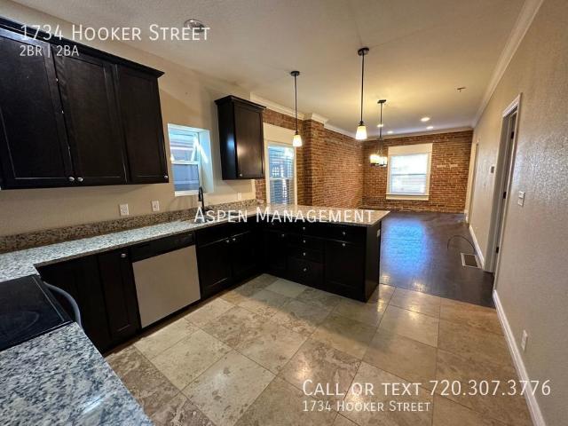 Charming 2BR house, fenced yards, exposed brick, open feel, great location! Hooker