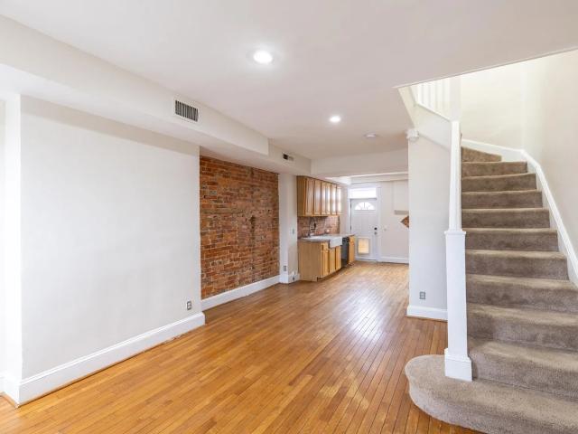 Charming 2BR Near Northeast Home with Exposed Brick & Hardwood Floors