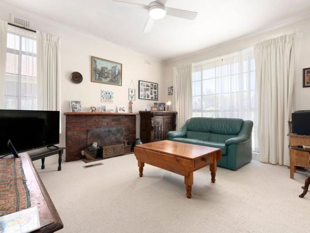 Charming 3 Bedroom Brick Home with Space, Comfort & Convenience